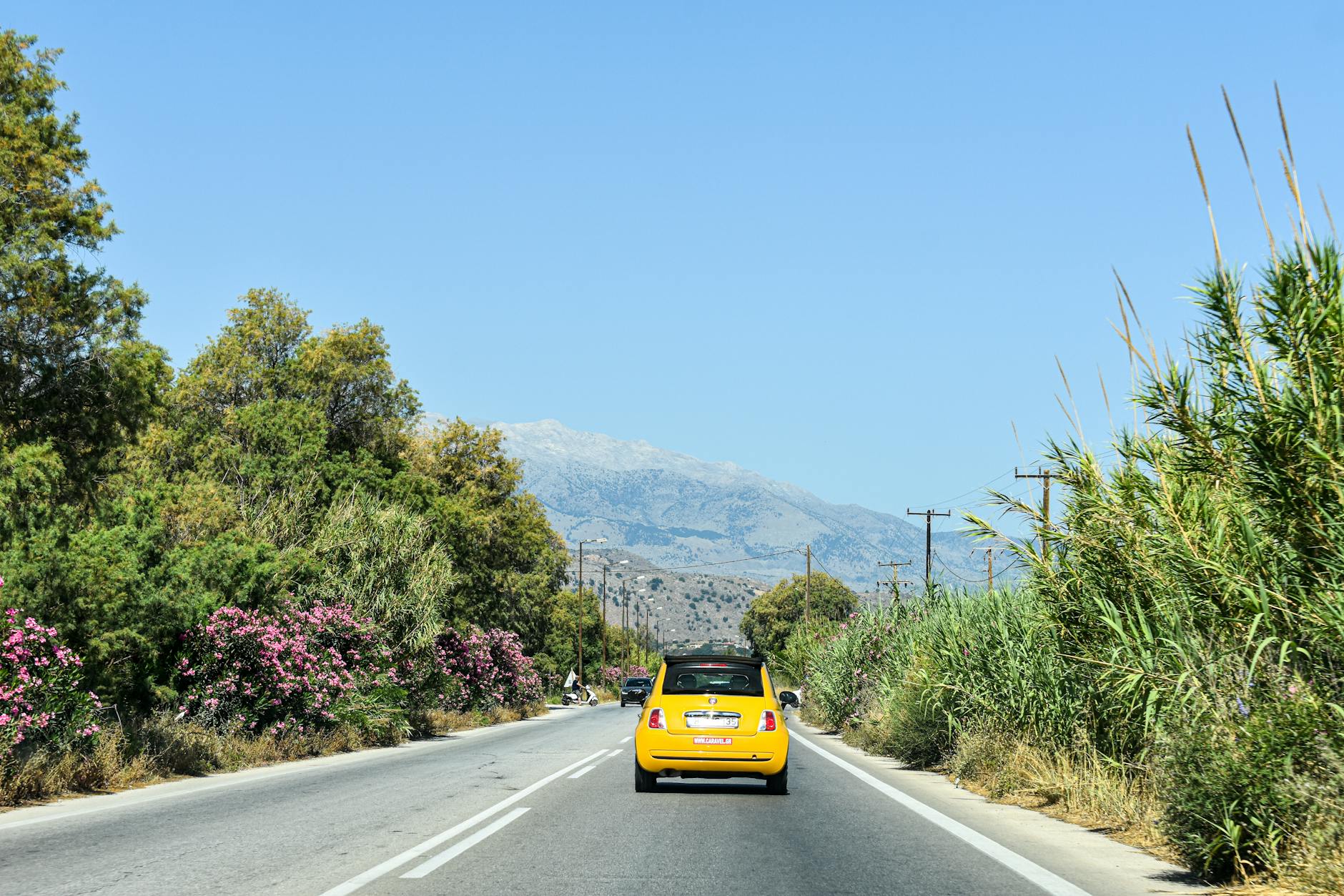 greece car rental insurance costs and coverage options displayed at rental counter
